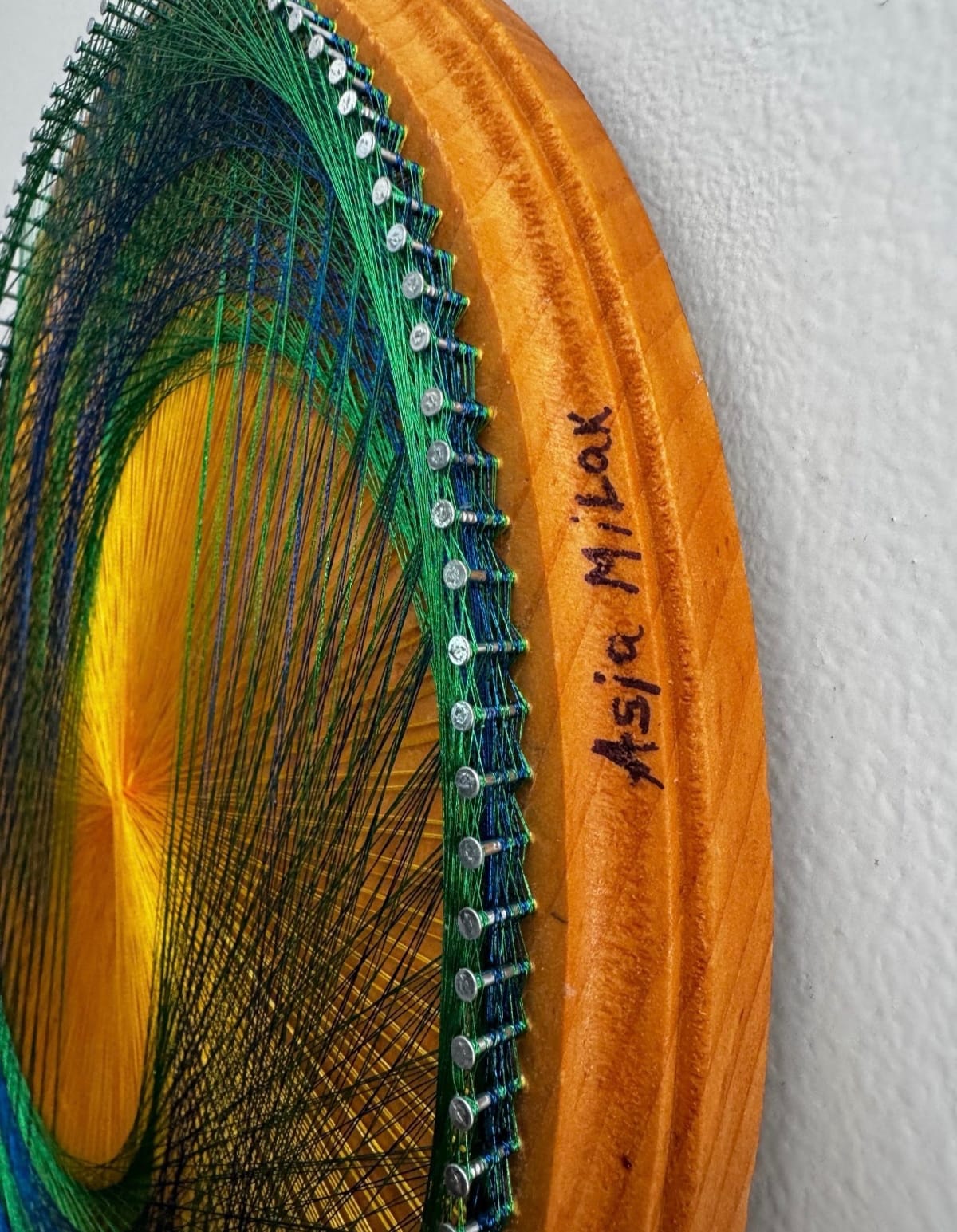 Golden Sunburst Spiral String Art – Blue Green Geometric Wall Art on Natural Wood, detail view 3 — handmade string art by Asja